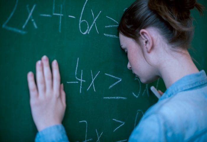 Teen girl with math troubles