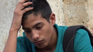 Depressed Hispanic teen