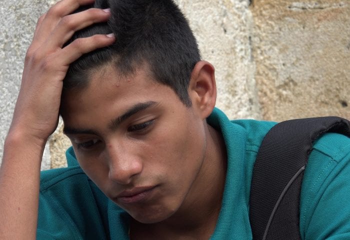 Depressed Hispanic teen